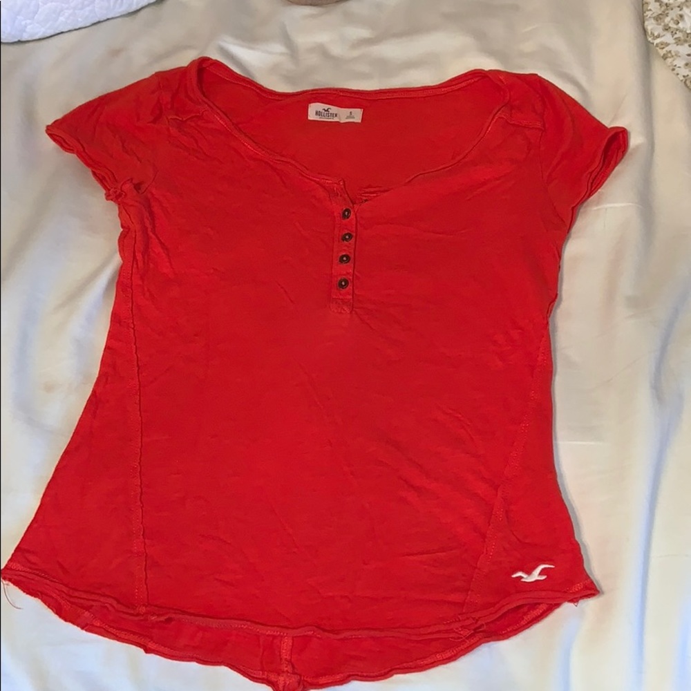 Orange woman’s Hollister buttton up shirt size S